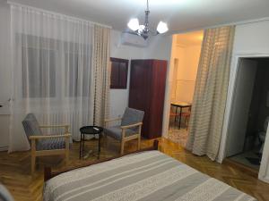 Postel nebo postele na pokoji v ubytování Guest House Major