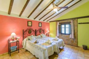 a bedroom with a large bed in a room at Spacious villa with pool in Priego de Córdoba - 350 m² in Priego de Córdoba