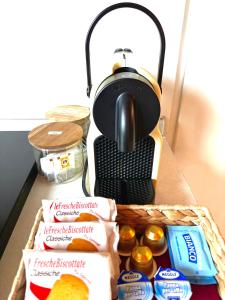 a lunch box with a toaster and some food at Casa sulle mura Romane - Old town in Bergamo +18 photos