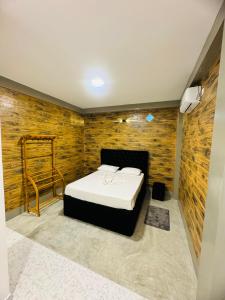 Postel nebo postele na pokoji v ubytování Resolve Garden Hotel