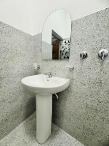 Koupelna v ubytování Resolve Garden Hotel + 37 fotografií