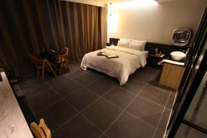 Postel nebo postele na pokoji v ubytování Hotel Cacao