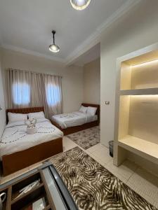 Postel nebo postele na pokoji v ubytování King hur pyramids inn
