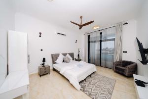 Postel nebo postele na pokoji v ubytování Coralcove apartment + 151 fotografií