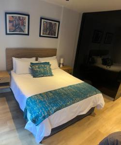 Postel nebo postele na pokoji v ubytování The Tokyo Luxury Apartments 210