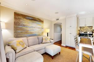 a living room with a couch and a table at Mariner's Watch 4236 in Kiawah Island