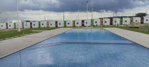 an empty swimming pool in front of a building at KIRAz in Turín