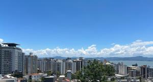 a view of a city with buildings and the water at Casa Espaçosa no Centro com Linda Vista para o Mar in Florianópolis