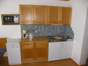 Kuchyň nebo kuchyňský kout v ubytování Ferienwohnung Ski-Hans