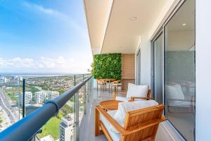 a balcony with a view of the ocean at Cartagena Dreams Luxury Oceanfront Suite wPool 4 in Cartagena de Indias