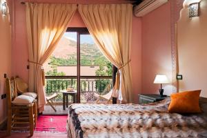 Postel nebo postele na pokoji v ubytování Riad Atlas Toubkal