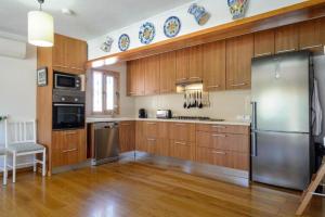 Η κουζίνα ή μικρή κουζίνα στο New! Villa Can Safres Raco +34 φωτογραφίες