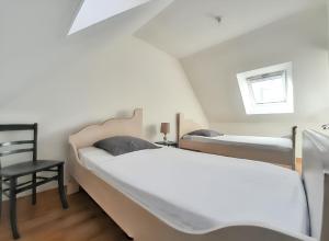 Posteľ alebo postele v izbe v ubytovaní Maison charmante à Concarneau avec spa extérieur