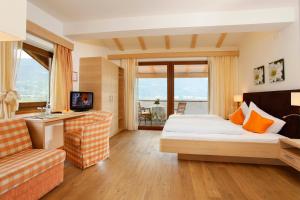 TV a/nebo společenská místnost v ubytování Hotel und Residence Johanneshof