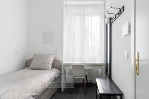 En eller flere senge i et værelse på Roomies Luxembourg Centre Gare + 21 billeder