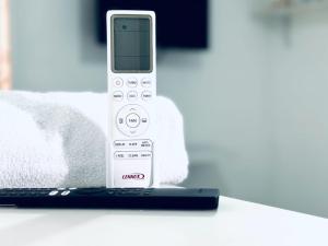 Ένα ή περισσότερα κρεβάτια σε δωμάτιο στο Todo cerca Apartamento Familiar en el corazón de San Salvador