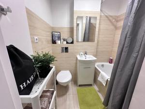 Kúpeľňa v ubytovaní 7Centrum CityApartHomePARKING