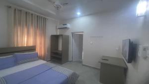 Katil atau katil-katil dalam bilik di C7 Hazelwood Residence & Suites