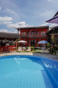 A piscina localizada em Pousada Ikabana ou nos arredores
