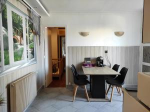 Posedenie v ubytovaní Logement entier agréable et accueillant