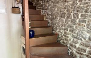 a set of stairs in a brick wall at Gorgeous Home In Donje Selo in Donje Selo na Šolti +9 photos