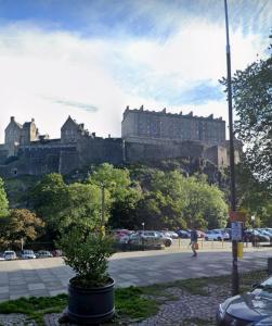a large castle on top of a hill at 2 Bedroom Sofa bed in livingroom Castle View 1st floor sleeps 6 in Edinburgh