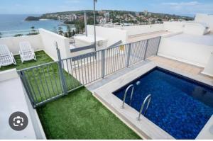 Πισίνα στο ή κοντά στο The Little Beachside Apartment +10 φωτογραφίες