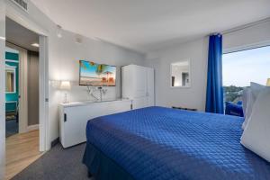The 7th Heaven in Myrtle Beach客房内的一张或多张床位