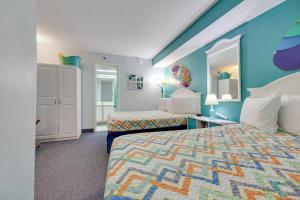 The 7th Heaven in Myrtle Beach客房内的一张或多张床位