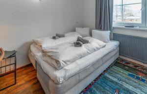 Postel nebo postele na pokoji v ubytování Attraktive Ferienwohnung Wagr,