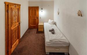 Postel nebo postele na pokoji v ubytování Attraktive Ferienwohnung Wagr,