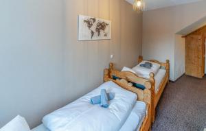 Postel nebo postele na pokoji v ubytování Attraktive Ferienwohnung Wagr,