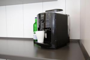 a coffee machine sitting on top of a counter at Meisterhaus Appartment 5 fischergasse 6 B in Glauchau