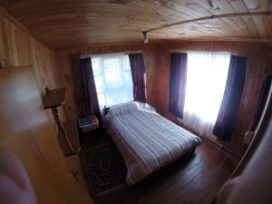 Ένα ή περισσότερα κρεβάτια σε δωμάτιο στο House located in Lifen just meters from the beach