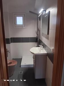 Koupelna v ubytování Apartment Las 1 + 17 fotografií