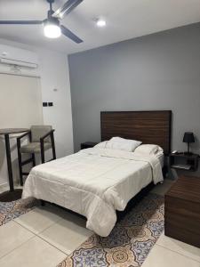 Postel nebo postele na pokoji v ubytování Apartamentos 31