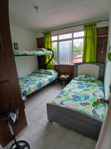 Photo de la galerie de l'établissement MANOA "Lugar de descanso" HABITACION CON VISTA A LA CIUDAD, FRESCO Y VENTILADO, à Ibagué