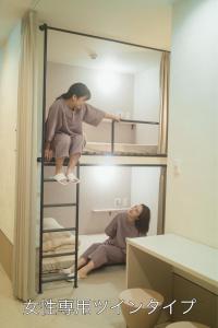 Hosté ubytování HOTEL minimumms女性専用カプセルホテルWomen only hotel