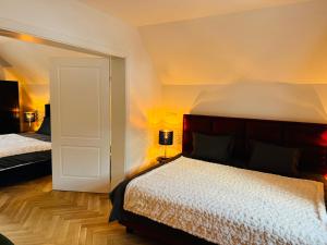 Letto o letti in una camera di Villa Edelweiss Stuhleck