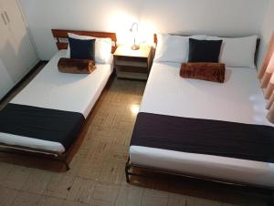 Hotel Alpino Armenia客房内的一张或多张床位