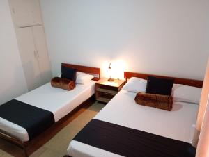Hotel Alpino Armenia客房内的一张或多张床位