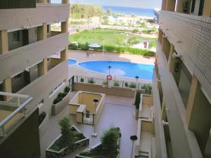 Bazén v ubytovaní Modern apartment in Oropesa, 60 m², with shared pool alebo v jeho blízkosti
