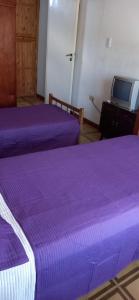 Postel nebo postele na pokoji v ubytování Descanso