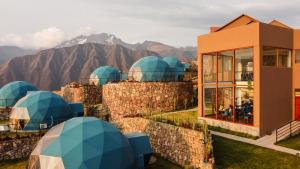 a rendering of a building with mountains in the background at Memorable Sacred Experience in Cusco