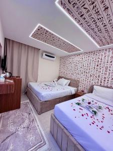 Letto o letti in una camera di Miami Pyramids View