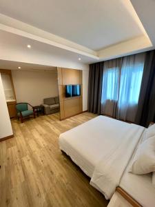 Postel nebo postele na pokoji v ubytování Crystal Crown Hotel Harbour View, Port Klang + 35 fotografií