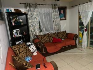 a living room with two couches and a couch at Vistas del río in Monterrey