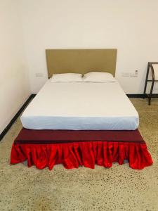 Postel nebo postele na pokoji v ubytování Resolve Garden Hotel
