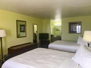 Postel nebo postele na pokoji v ubytování Motel 6 Tulia, TX