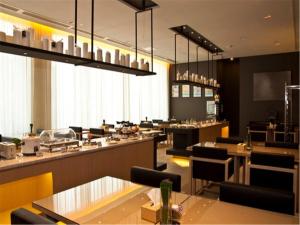Restaurace v ubytování Jinjiang Inn Fuzhou Cangshan Olympic Centre